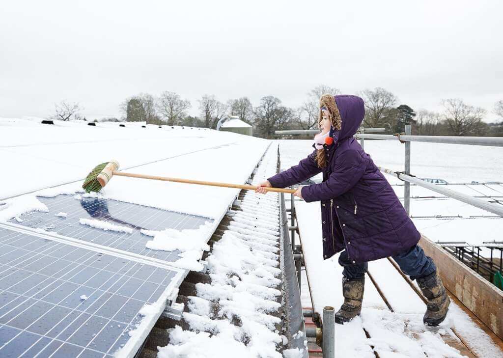Clear Snow Solar panels in winter Clear Snow Solar panels in winter