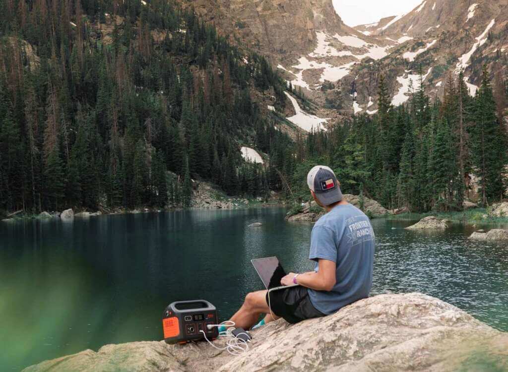 power station charging macbook during hiking power station charging macbook during hiking