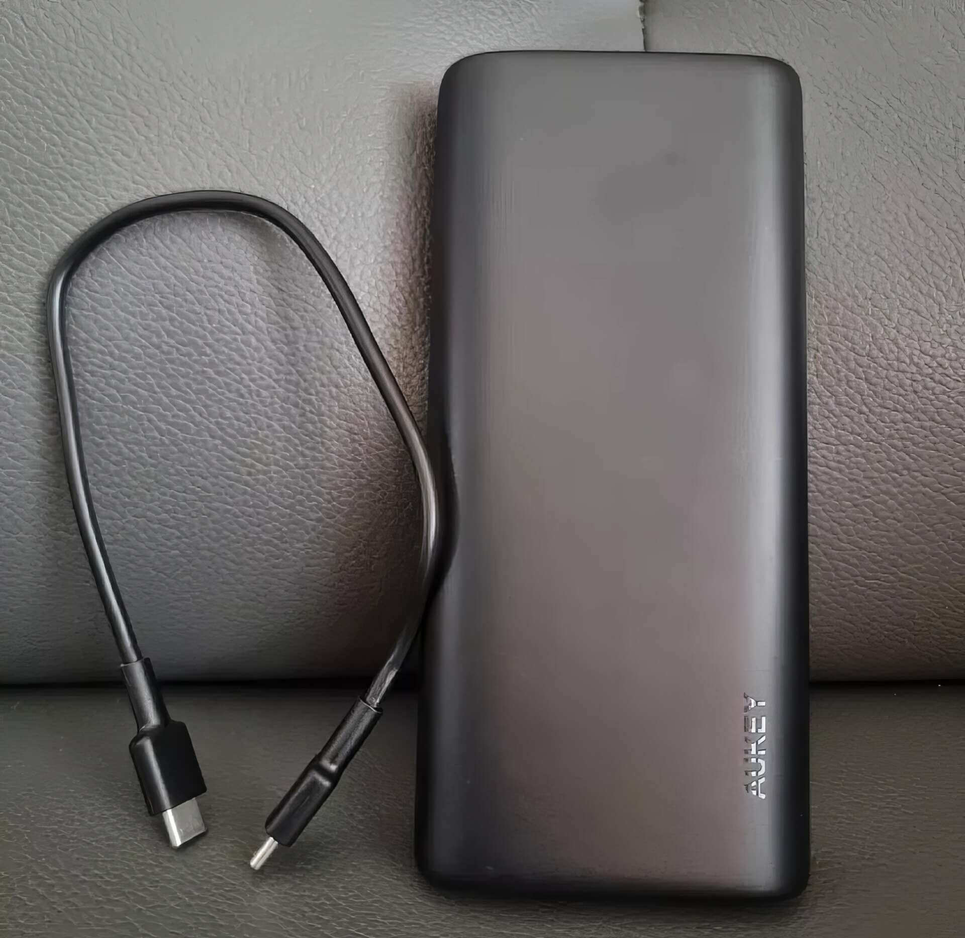 AUKEY PB Y43 Sprint X 20K 65W 20000mAh On Sofa AUKEY PB Y43 Sprint X 20K 65W 20000mAh On Sofa